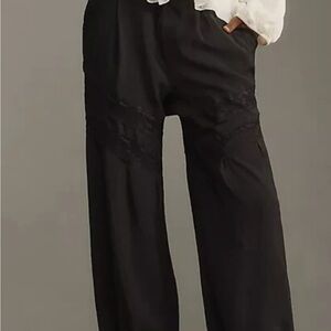 Anthropologie pieced lace joggers Black Pants with Lace Accents